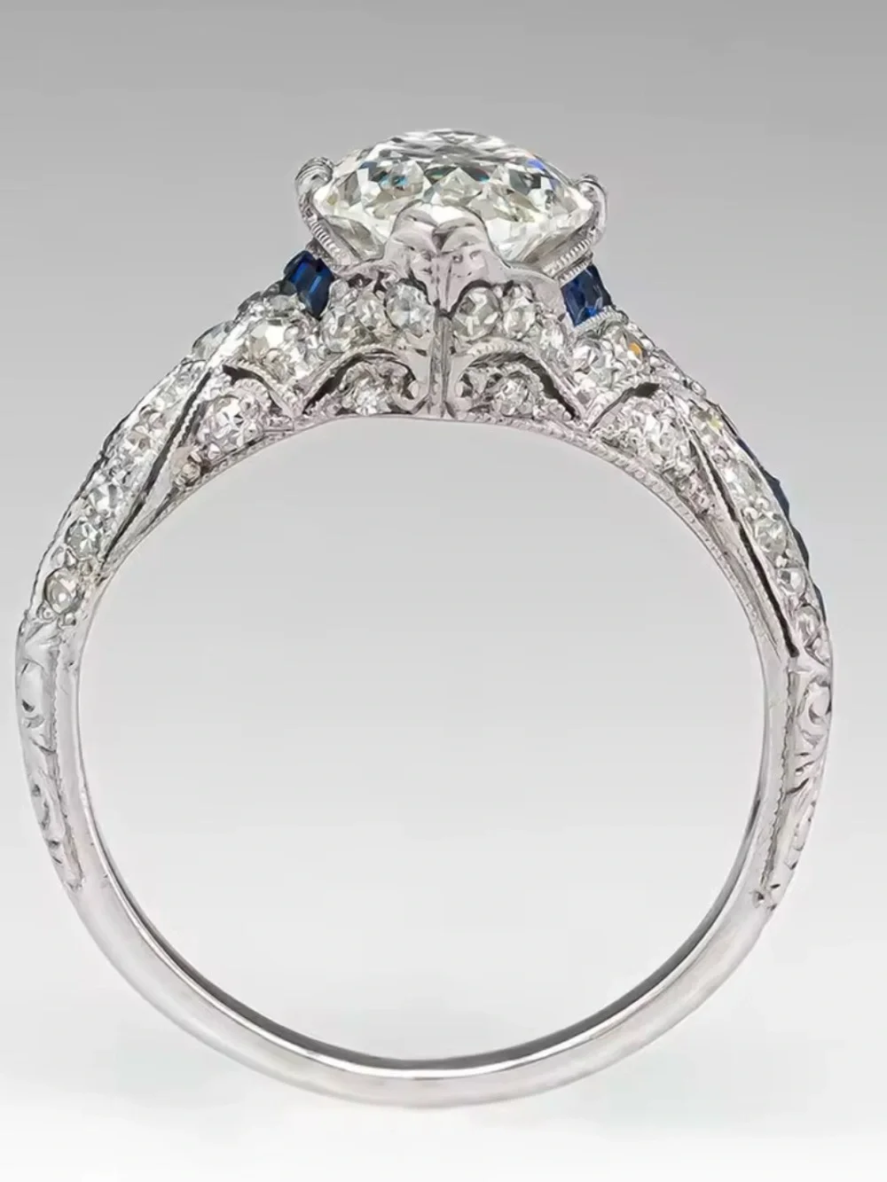 Vintage-Style White Diamond Navette Ring with Blue Accents